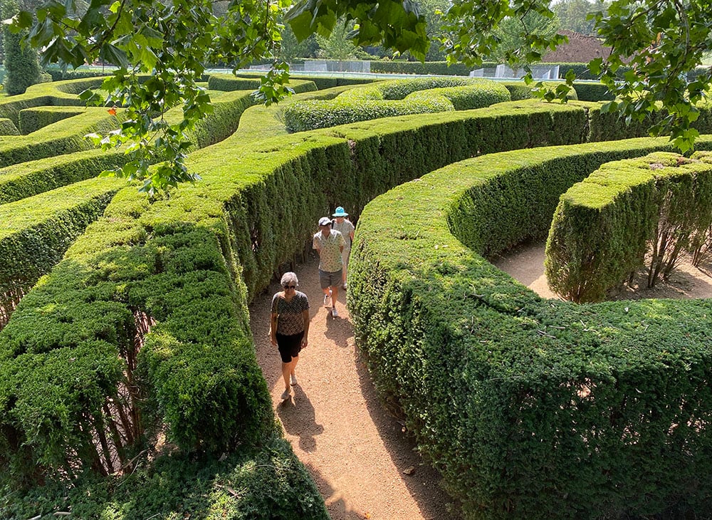Visitors walking through the maze at The Morton Arboretum.